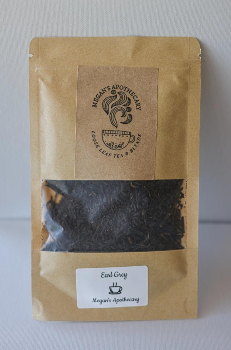 A kraft pouch of Earl Grey loose leaf tea
