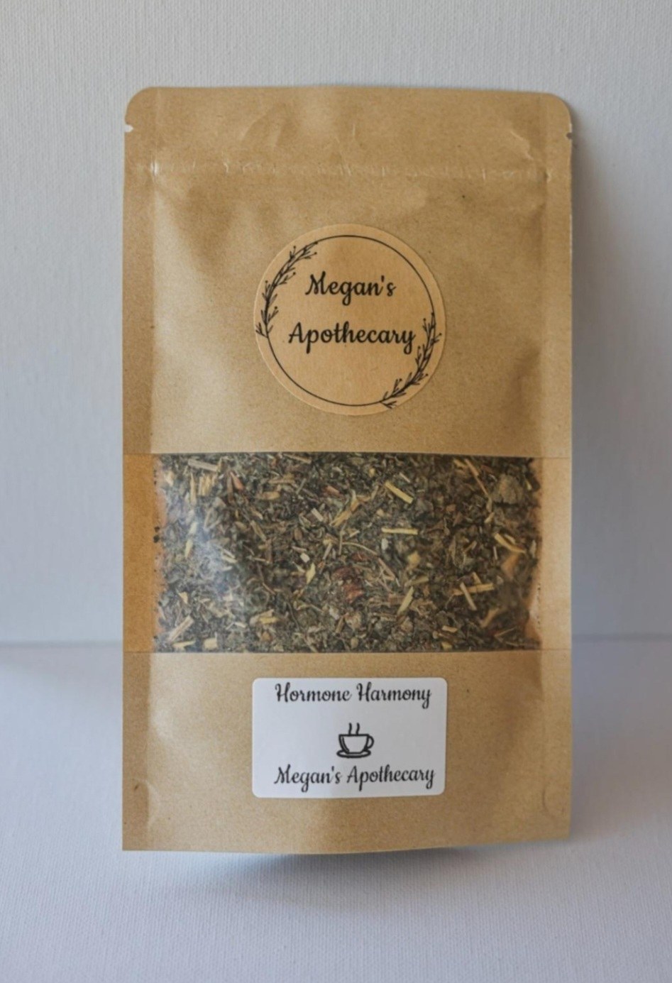A kraft pouch of Hormone Harmony herbal blend