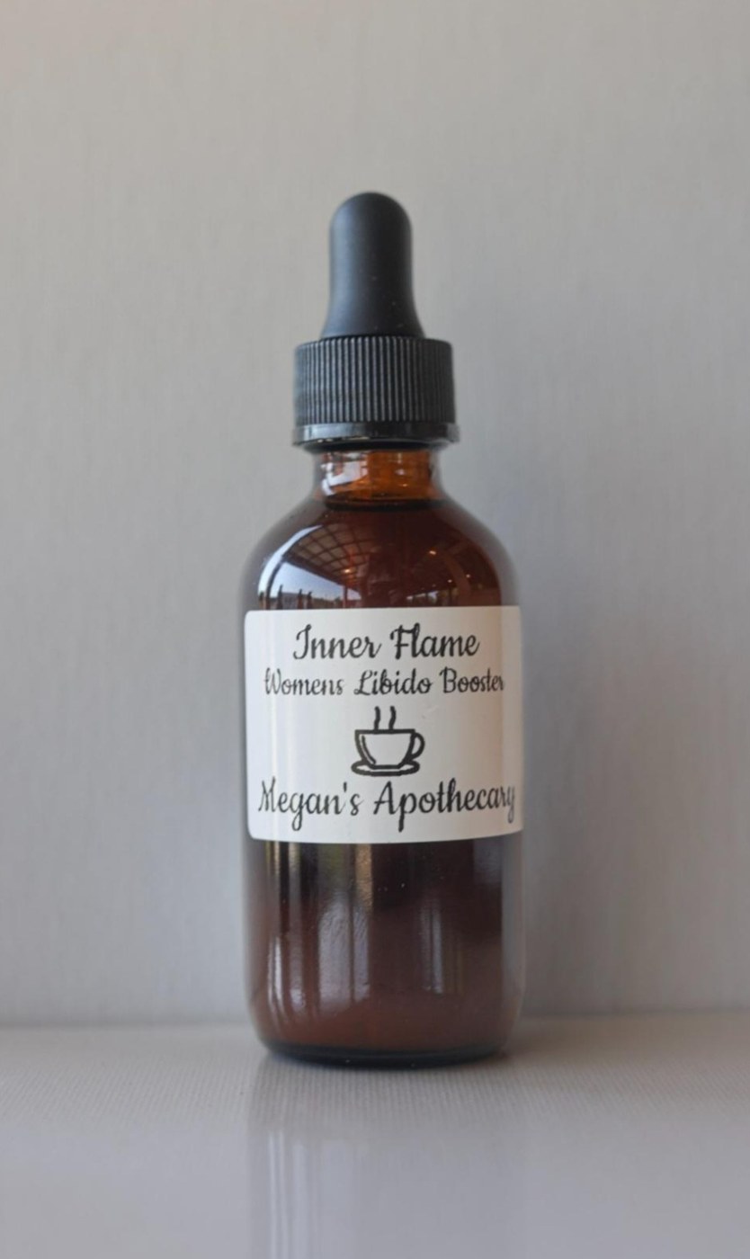 An amber dropper bottle of Inner Flame tincture
