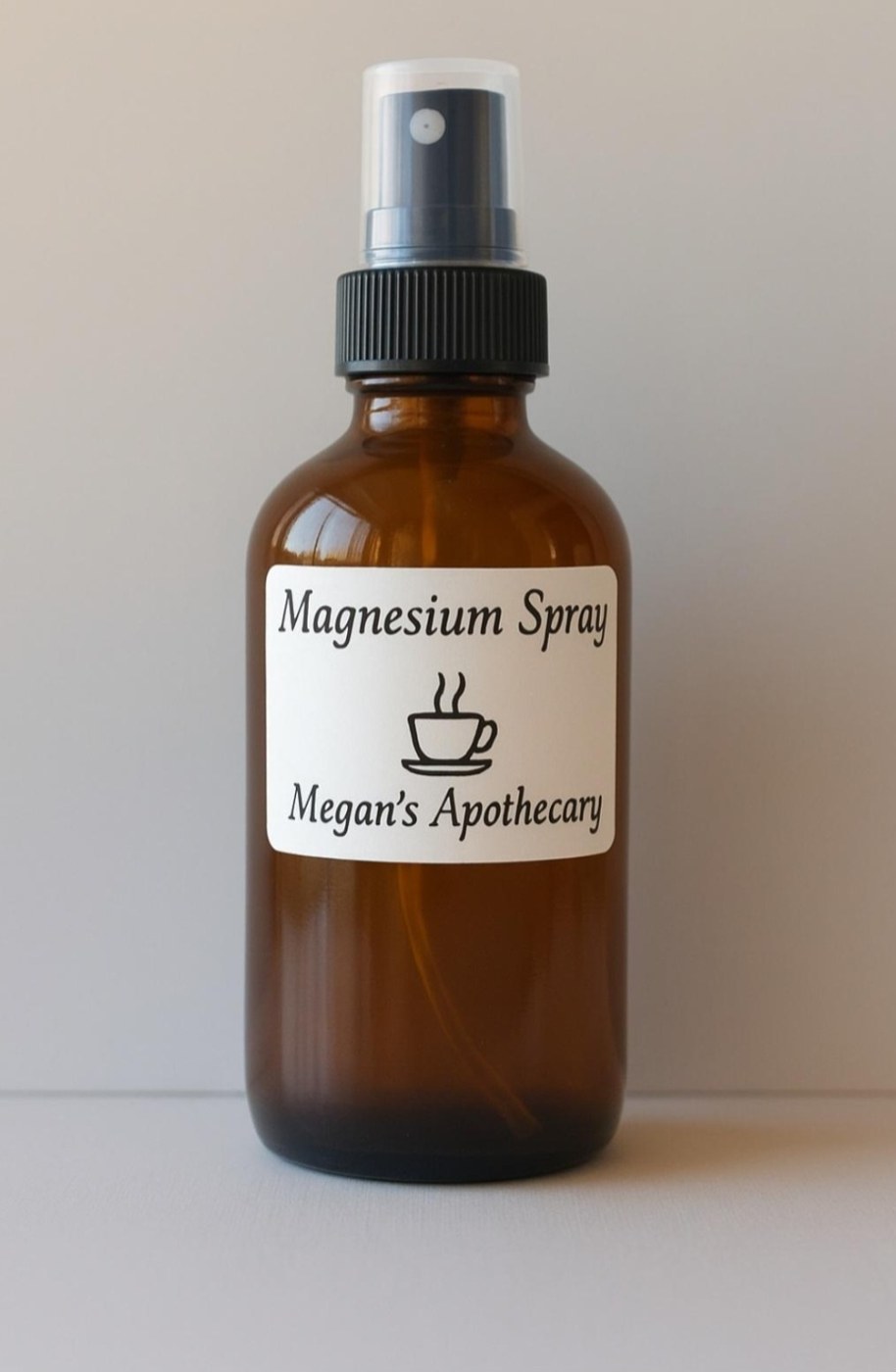An amber spray bottle of magnesium spray